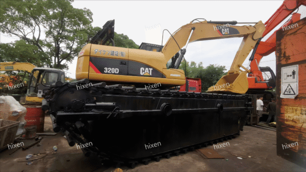 HIXEN excavator 320D CAT construction machinery for heavy-duty excavation work at construction site.