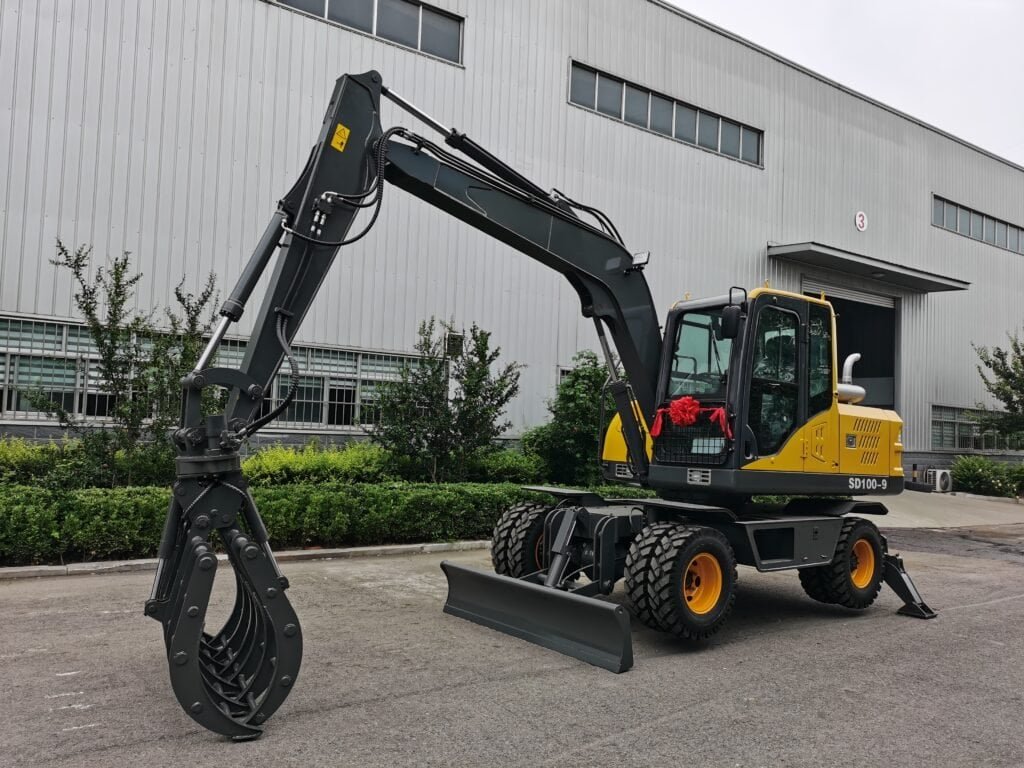 Compact HIXEN excavator with hydraulic grapple attachment, ideal for construction and landscaping projects, showcasing durable design and versatile functionality.