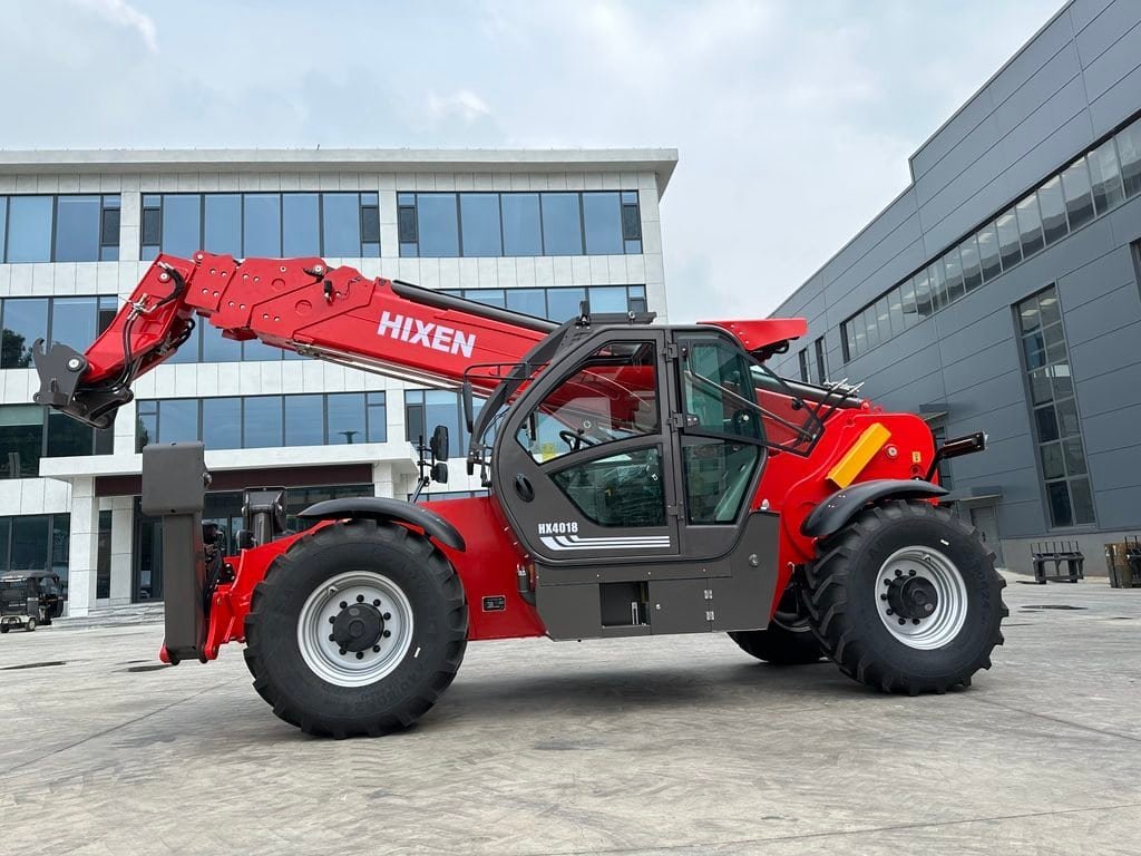 A mid-range telehandler at a commercial construction site